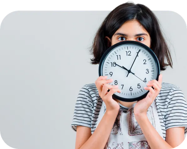 Woman holding large alarm clock in front of face, emphasizing urgency of time
